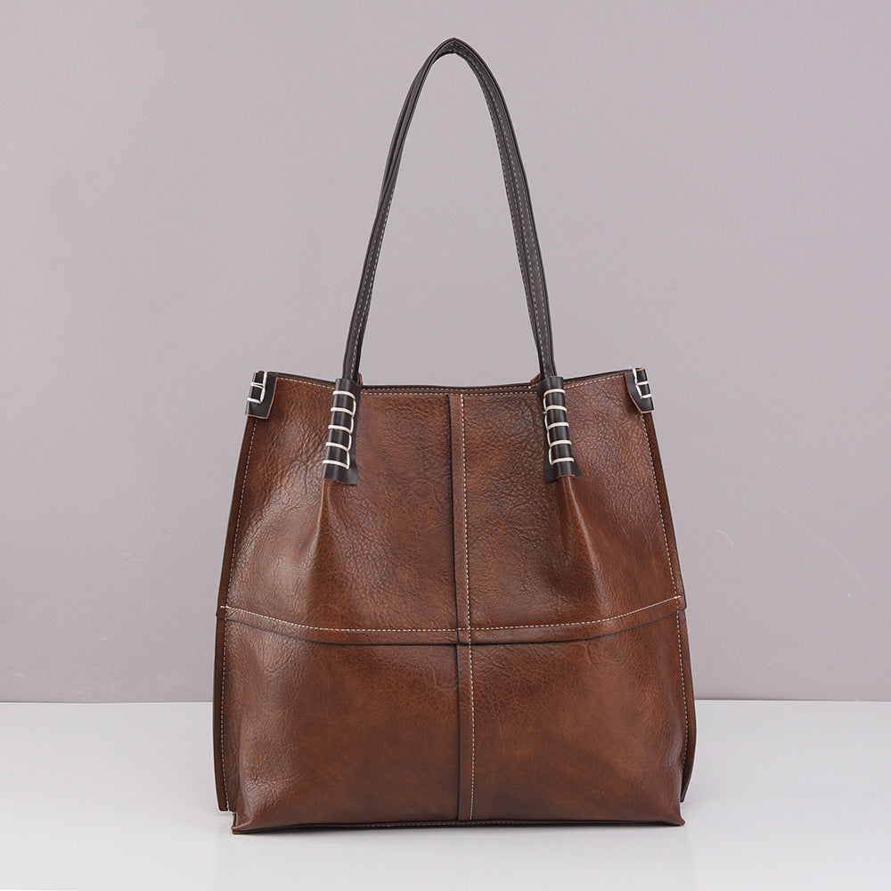 Internacional Bolsa tote minimalista fashion Bolsa de ombro feminina Novo modelo versátil para o dia a dia Bolsa Grande capacidade Bolsa tote atacado