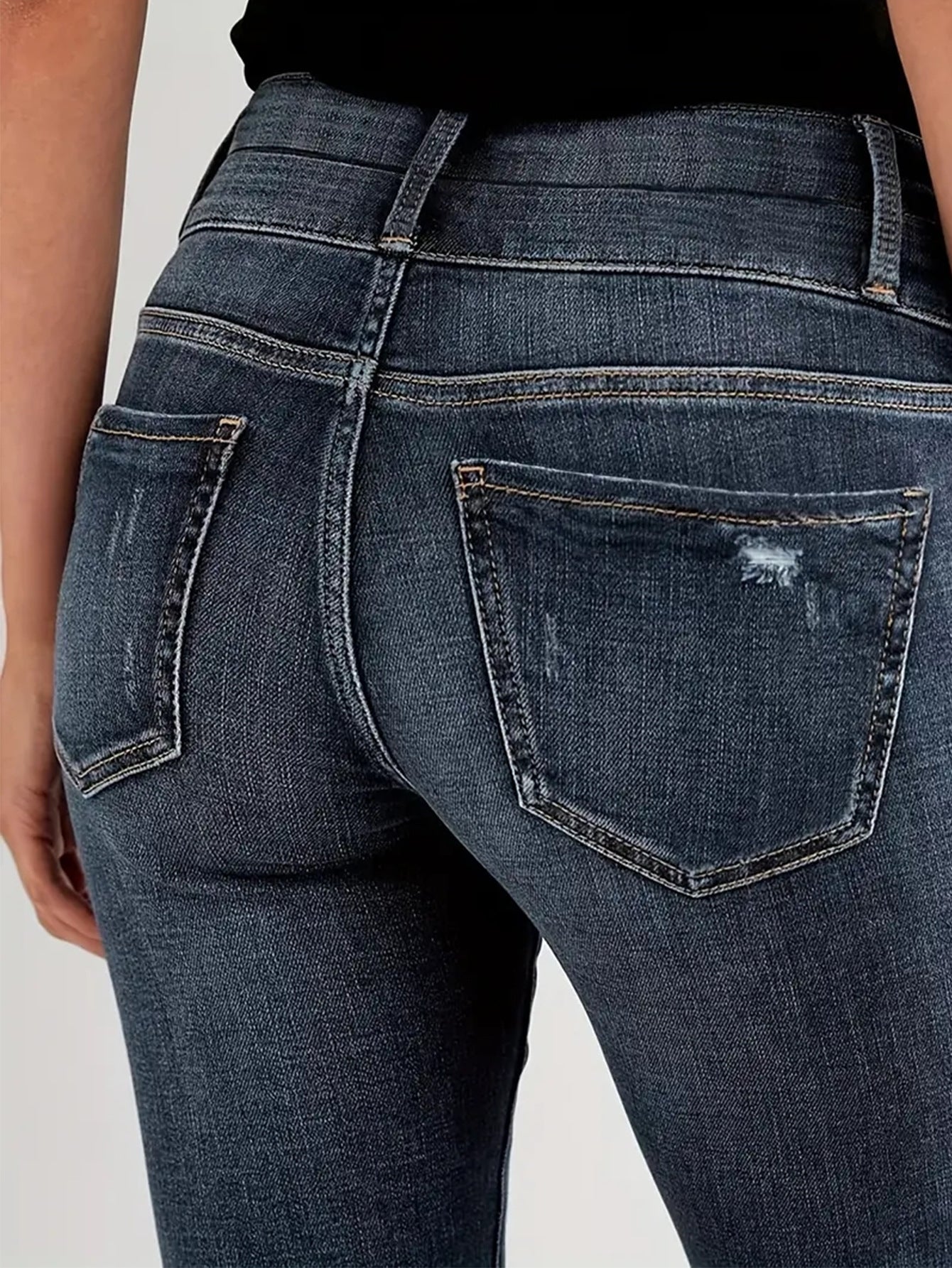 Women's jeans vintage stretch slimming small legged pants are fashionable and versatile, with double button design and dark blue denim trousers