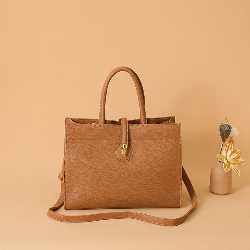 Bolsa tote primavera/verão Novo modelo Bolsa de mão feminina acabamento sofisticado Grande capacidade Bolsa de ombro minimalista para o trabalho para o dia a dia Bolsa