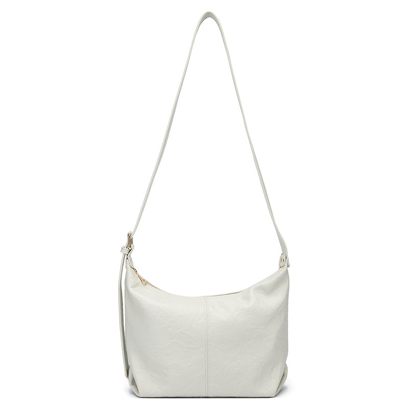 Bolsa de senhora 2025 nova tendência retro em pele macia, modelo dumpling, bolsa tote texturizada, bolsa de ombro a tiracolo.