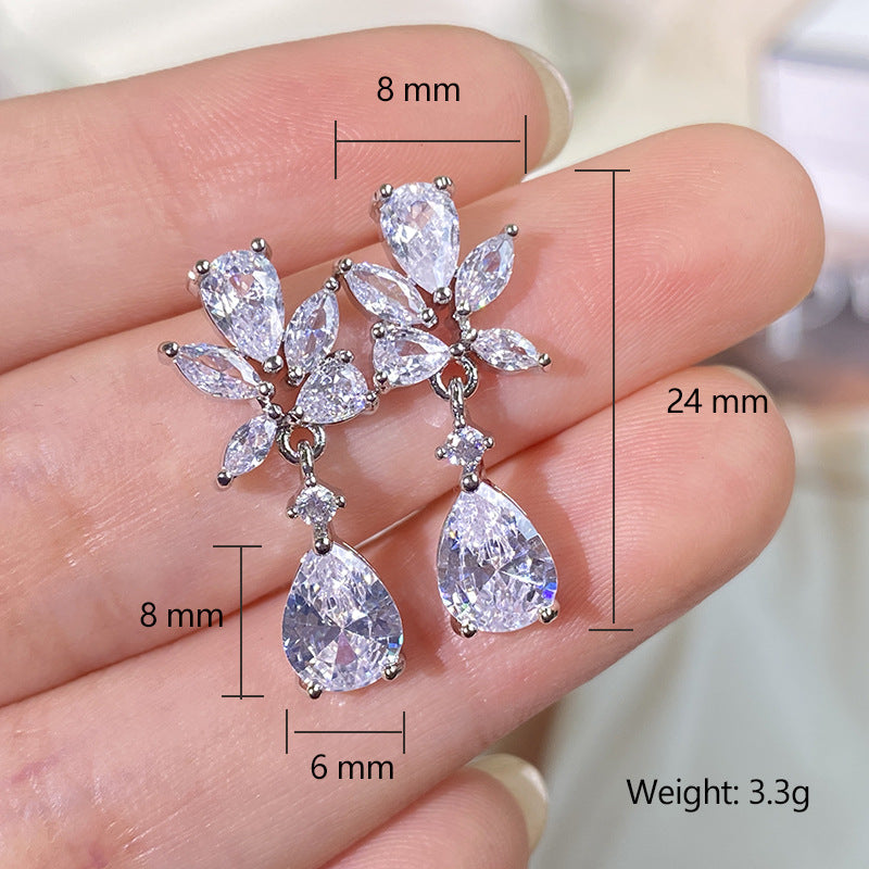 European and American exquisite creative waterdrop petal earrings for women, high-end design with a subtle design sense of micro-set AAA pearl zircon fashion earrings