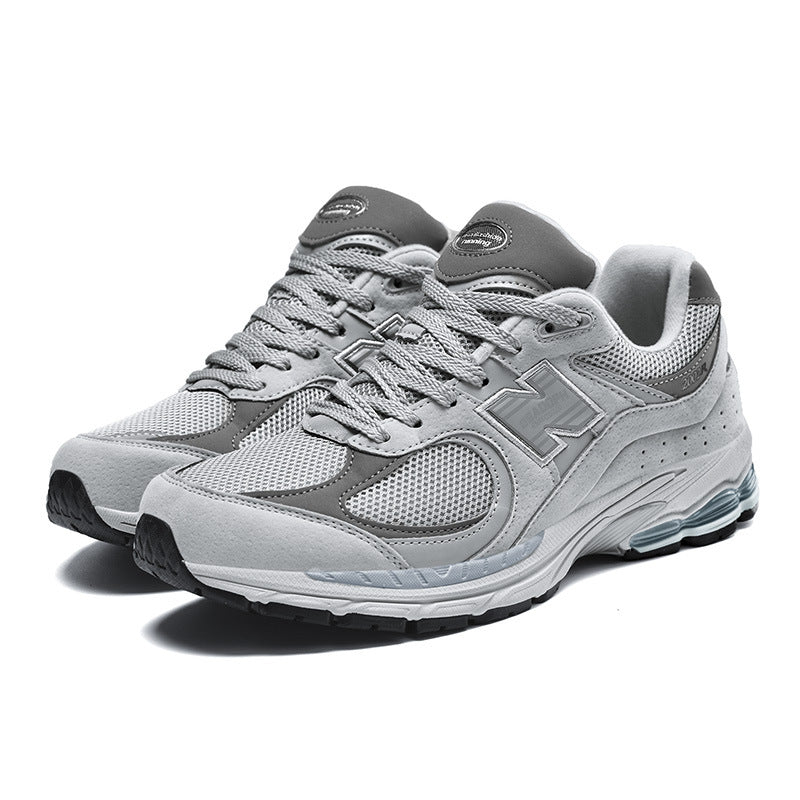 Tênis masculinos primavera e outono novo equilíbrio cool corrida Putian tênis de corrida 2002R retro casal versátil sapatos masculinos atacado mulheres