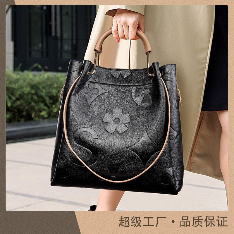Internacional Bolsa de mão Novo modelo fashion acabamento sofisticado Bolsa europeia e americana estampado em relevo Bolsa de ombro Grande capacidade elegante Bolsa bucket feminina
