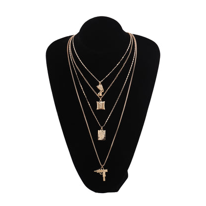 European and American cross-border jewelry, uzi machine gun, dollar pendant necklace, women, queen's head, alloy letters, multi-layer necklace