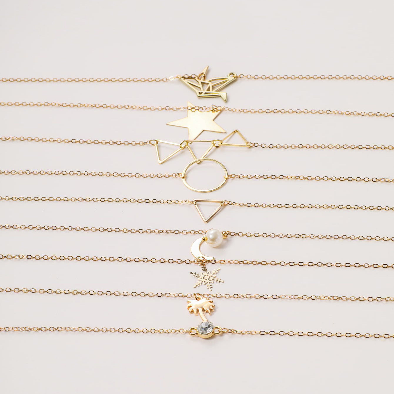 European and American cross-border jewelry, fashion geometric stars, coconut palms, snowflake necklaces, women, versatile pearl rings, triangle necklaces