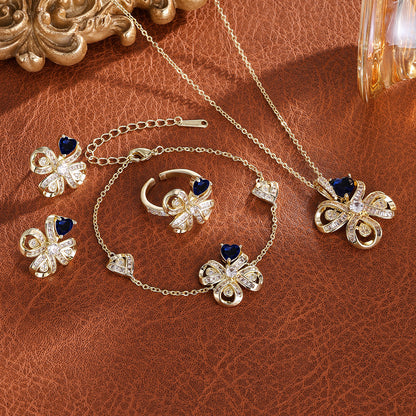 The new Baojiayong blooming flower bracelet plated with 18K gold floral blue diamond-set simple and sophisticated fashion women's set