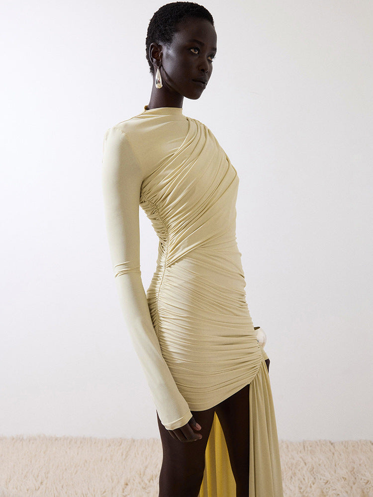 Foreign trade autumn and winter new European and beautiful fashion solid color crew neck long sleeve pleated hip irregular streamer dress