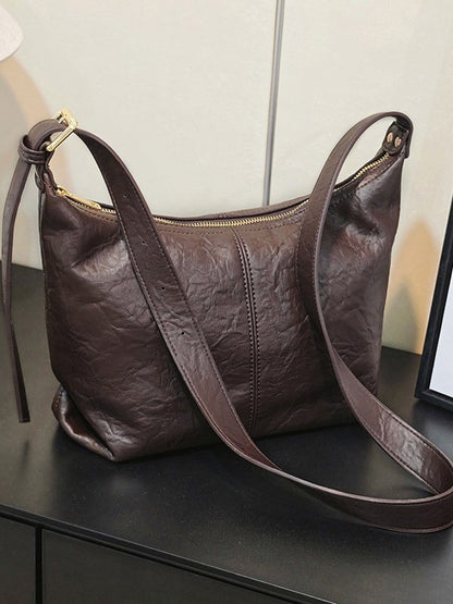 Bolsa de senhora 2025 nova tendência retro em pele macia, modelo dumpling, bolsa tote texturizada, bolsa de ombro a tiracolo.