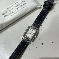 Black belt silver frame white noodles