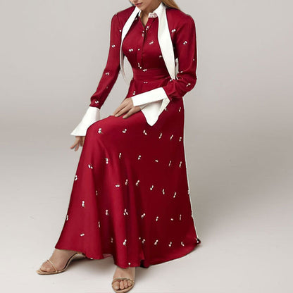 Vestido de primavera 2026 com um novo estilo europeu e elegante, com um estampado sofisticado, saia comprida, lapela e corte largo.