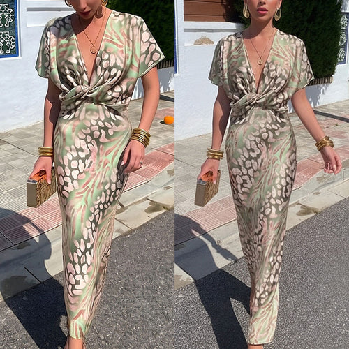 Vestido curto para mulher com estampado moderno, decote em V, cintura marcada e manga curta torcida, da coleção Primavera 2026, para mulher. Confecionado com tecido europeu e americano.