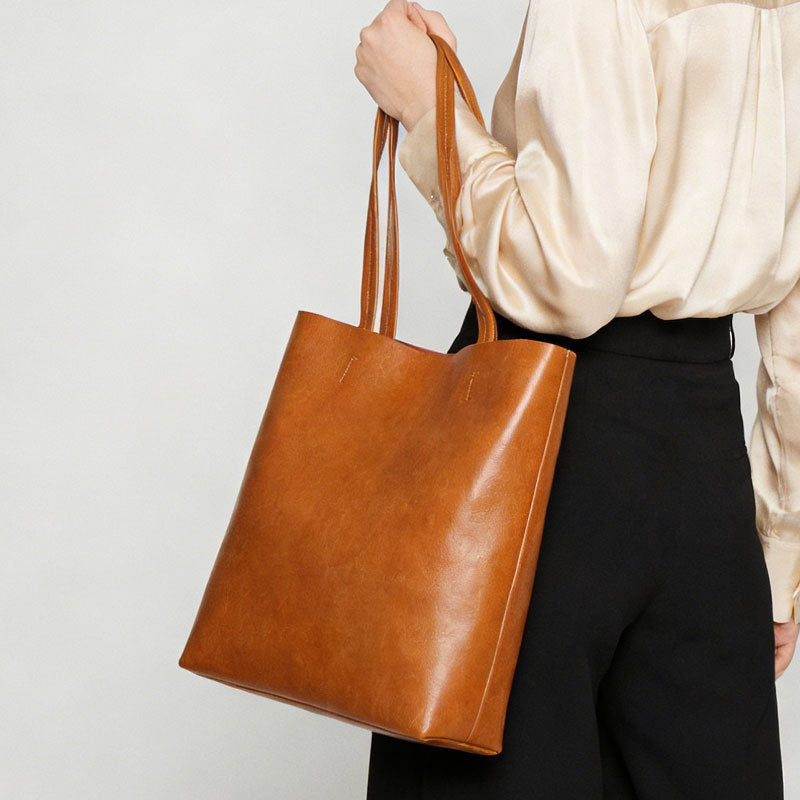 Bolsa de ombro Internacional Novo modelo couro genuíno encerado Bolsa minimalista Grande capacidade Bolsa tote fashion para o dia a dia Bolsa bucket atacado