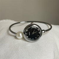 Silver band black face