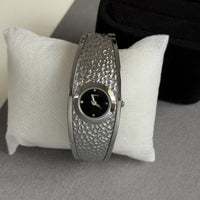 Silver band black face