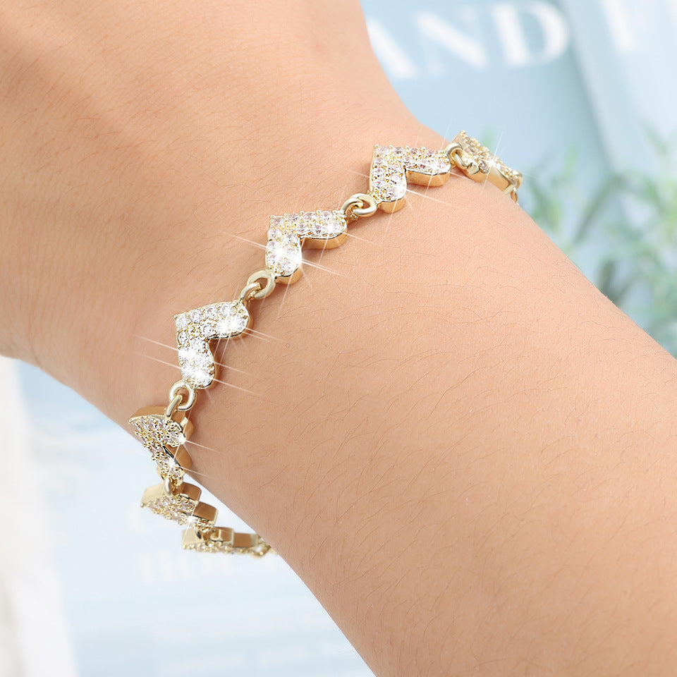 Cross-border bestseller heart-shaped fully inlaid zircon bracelet, light luxury niche wristband, versatile commuting hand accessory, TEMU bestseller