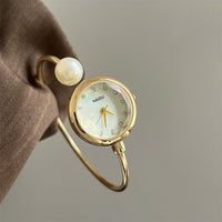 Gold belt white surface