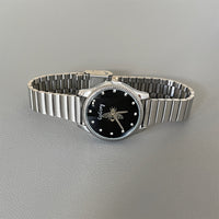 Silver band black face