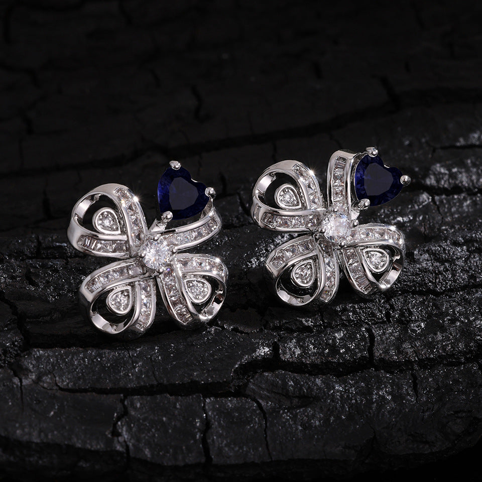 The new Baojiayong blooming flower bracelet plated with 18K gold floral blue diamond-set simple and sophisticated fashion women's set