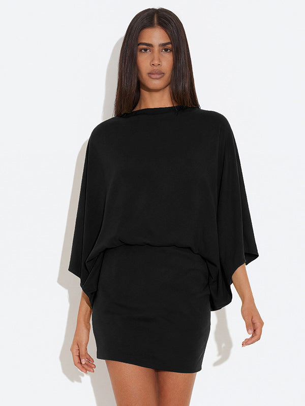 Foreign trade autumn and winter new European and beautiful clothing temperament solid color crew neck bat long sleeve open back short loose dress for women