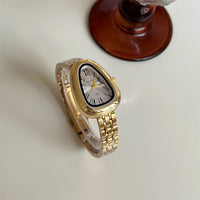 Gold belt white surface