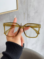 The olive green frame is white and flat