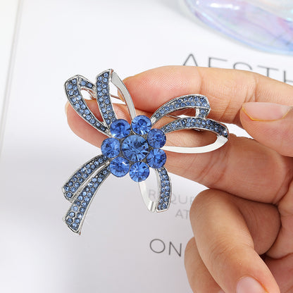 Fashionable Austrian blue crystal simple alloy bow brooch, high-end collar pin, silk scarf, fastener, garment decoration, corsage