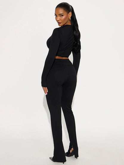 Foreign trade autumn and winter new European and beautiful women's clothing sexy V-neck crop navel long-sleeved top high-waisted skinny trousers two-piece set for women