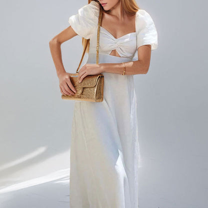 2026 spring cross-border European and beautiful clothing temperament slimming sexy hollow puff sleeves solid color large swing waist dress