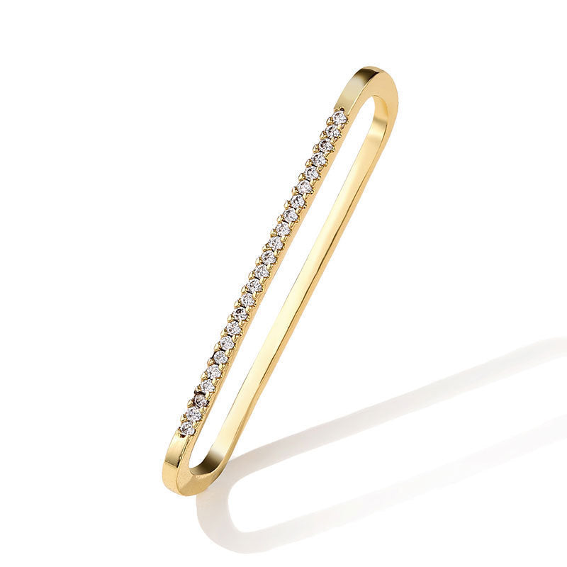 Geometric long oval hollowed out large earrings, European and American export style, fashionable copper zircon single earrings