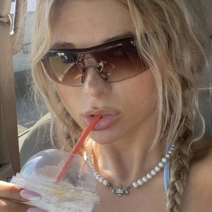 2022 Europe and America hot selling one-piece sunglasses men's and women's sunglasses driving and cycling travel sunglasses wholesale