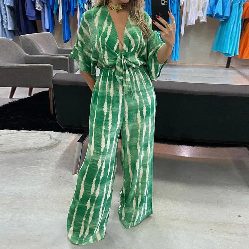 2025 Amazon wish trend European and American plus size women's fashion V-neck lace-up print loose jumpsuit women's 661