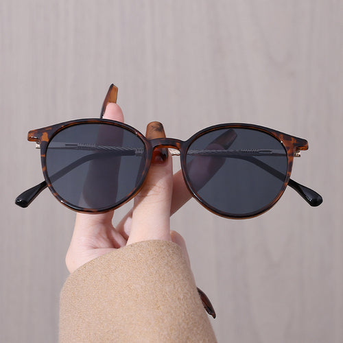 Leopard print round frame sunglasses for women, 2025 new high-end metal sunglasses, versatile personalized cross-border sunglasses for men