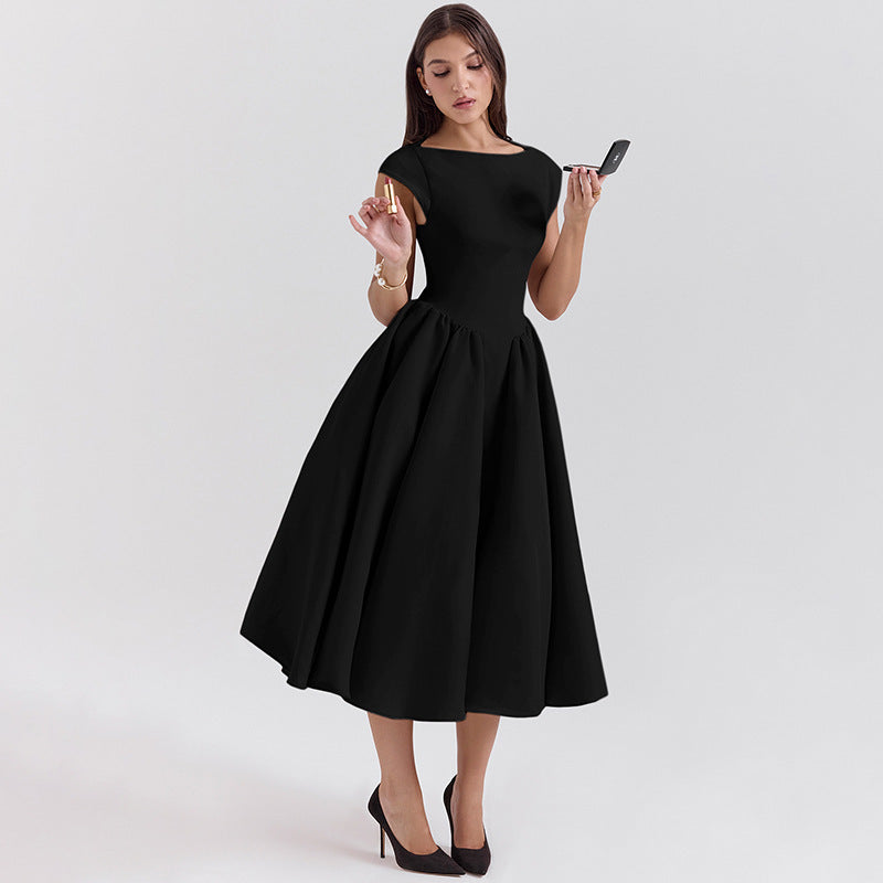 Foreign trade 2025 spring and summer new European and beautiful clothing temperament solid color crew neck open back slim waist slim swing dress for women