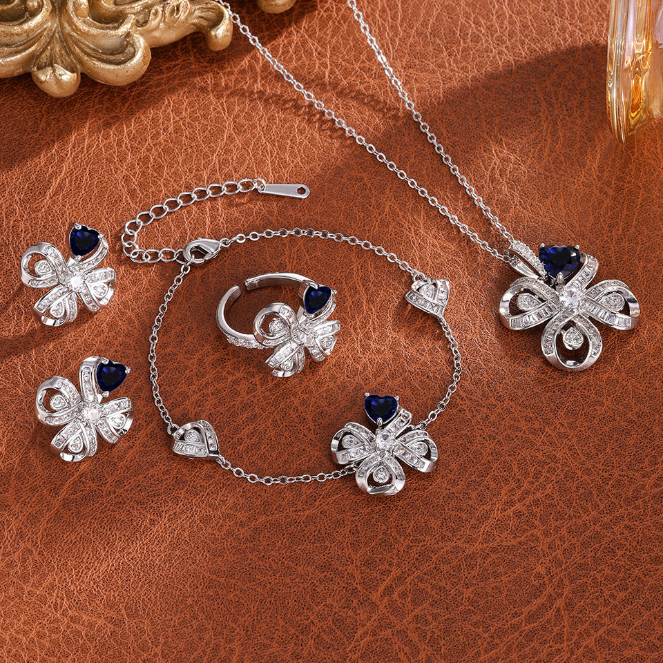 The new Baojiayong blooming flower bracelet plated with 18K gold floral blue diamond-set simple and sophisticated fashion women's set