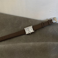 Green belt silver frame white face