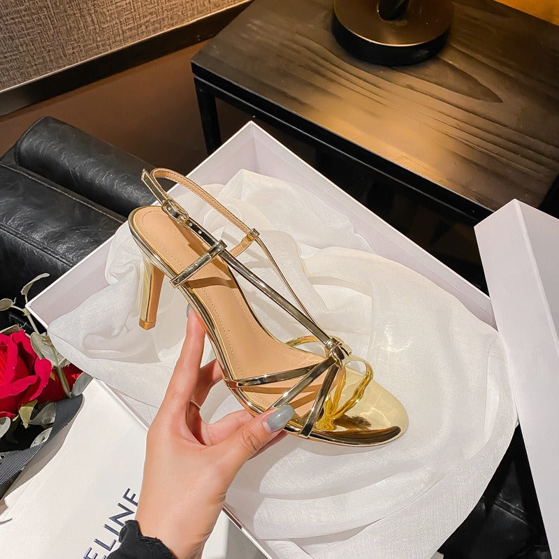 YX temperament celebrity gold strap high heels women's 2026 new one-line strap thin heel Roman sandals French temperament