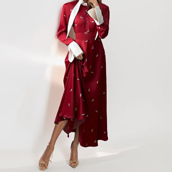 2026 spring new European and beautiful clothing temperament, elegant printed design, long skirt, lapel and large swing spring dress