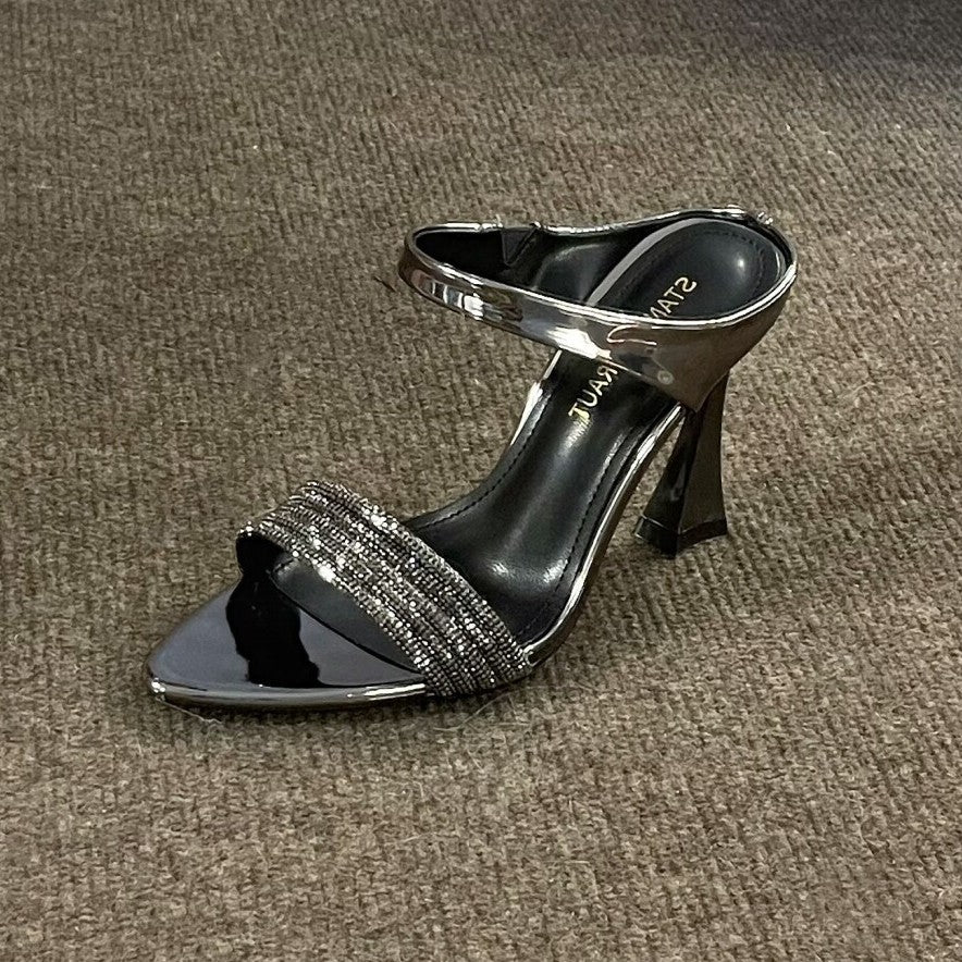 WO Huizhou City's 2026 autumn new one-line strap sandals, horseshoe heels, gun-colored high heels, fashionable European and aesthetic