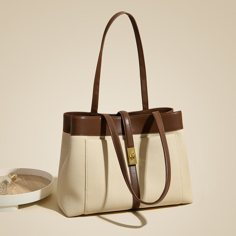 Bolsa tote feminina Novo modelo elegante Bolsa de ombro design sofisticado versátil Bolsa Grande capacidade para o dia a dia bolsa de lona Internacional