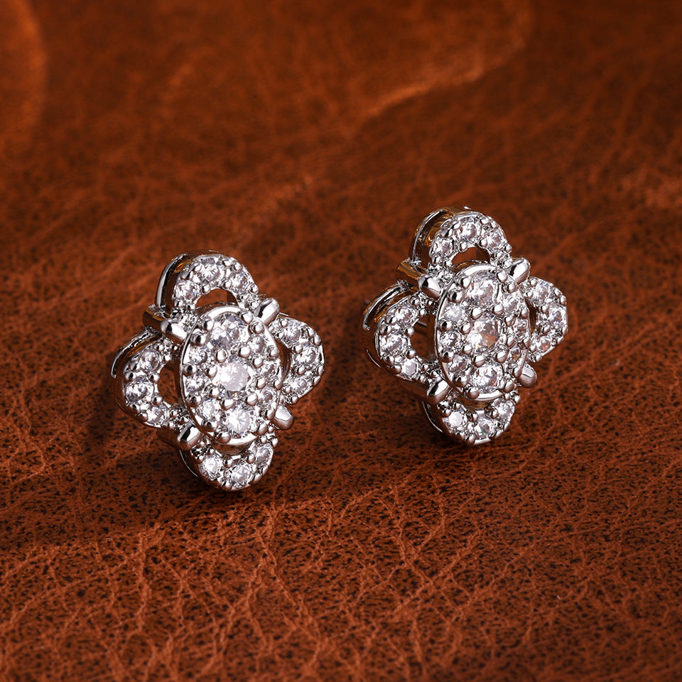 RAKOL Niche Design, Exquisite Hollow-Out Zircon Floral Earrings, Light Luxury Style Studs, Compact and Versatile Earrings