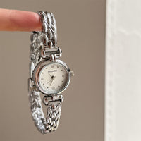 Silver belt white surface