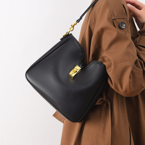 Bolsa de ombro Novo modelo fashion Bolsa minimalista couro macio para o dia a dia Bolsa de ombro curta Grande capacidade elegante Bolsa transversal bolsa atacado