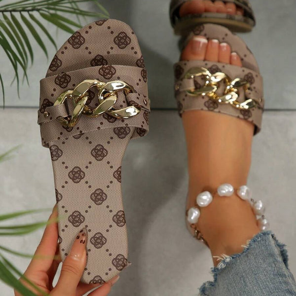 Cross-border women's shoes wholesale fashion slippers classic temperament versatile solid color metal decoration round toe flat sandals