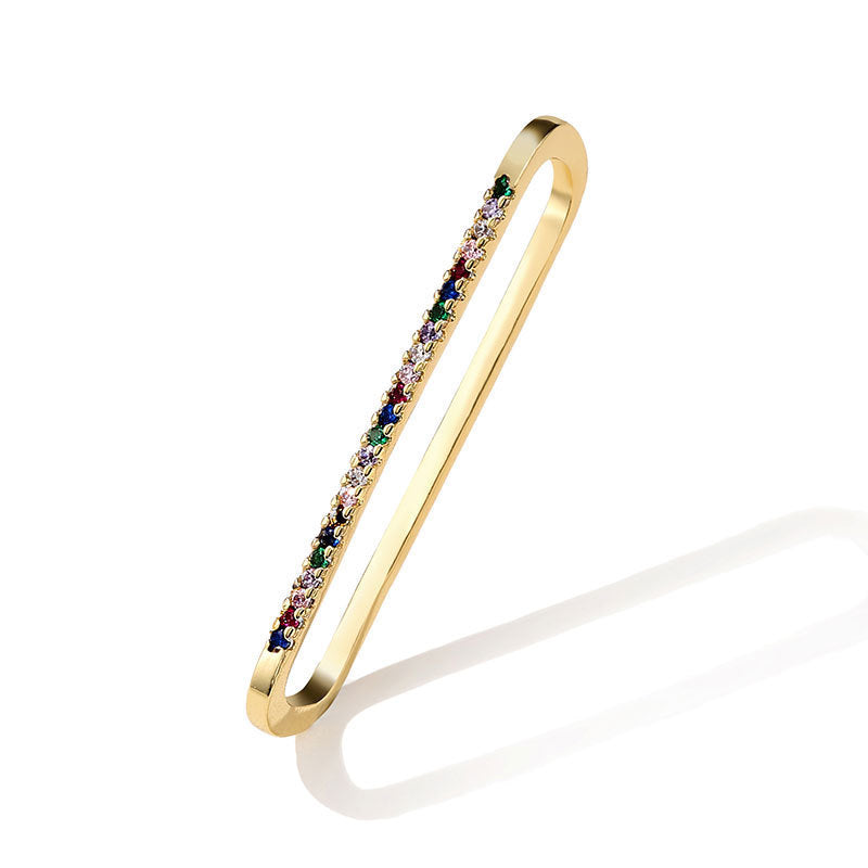Geometric long oval hollowed out large earrings, European and American export style, fashionable copper zircon single earrings