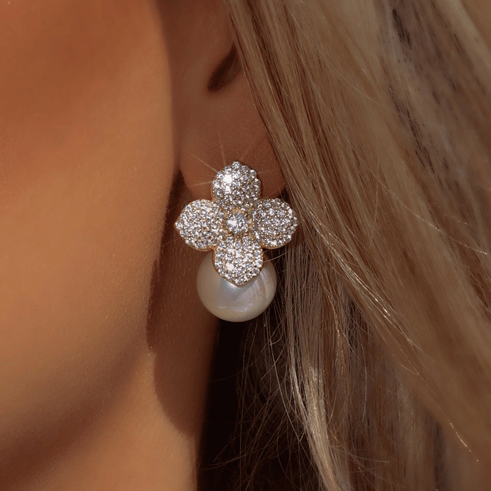 French niche design pearl earrings for women, high-end creative floral minimally inlaid zircon ear accessories for women