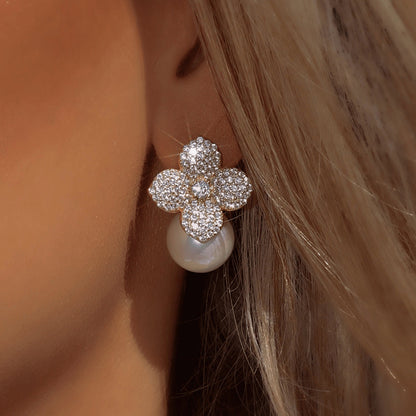 French niche design pearl earrings for women, high-end creative floral minimally inlaid zircon ear accessories for women