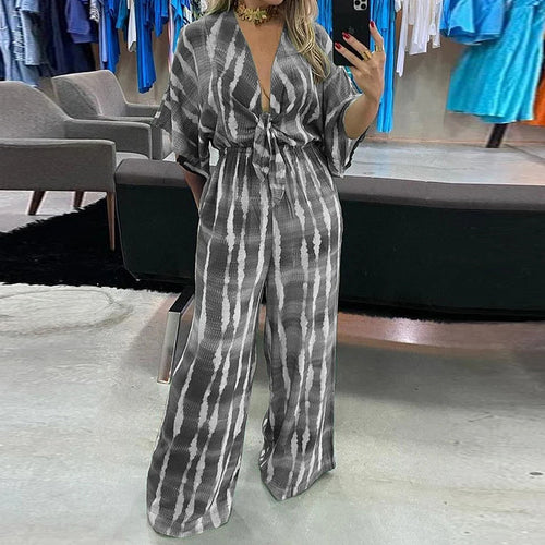 2025 Amazon wish trend European and American plus size women's fashion V-neck lace-up print loose jumpsuit women's 661