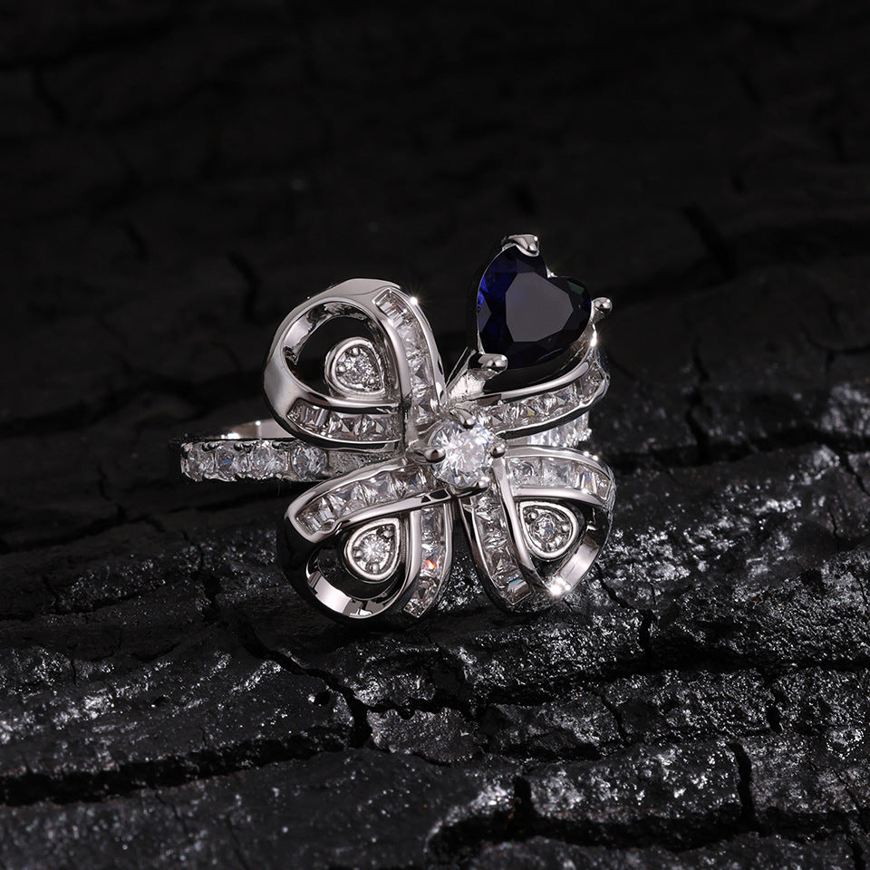 The new Baojiayong blooming flower bracelet plated with 18K gold floral blue diamond-set simple and sophisticated fashion women's set