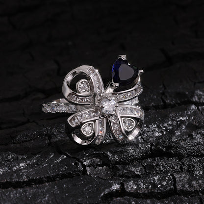 The new Baojiayong blooming flower bracelet plated with 18K gold floral blue diamond-set simple and sophisticated fashion women's set