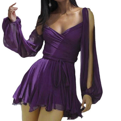 Vestido plissado sexy e elegante de cor sólida com decote em V, novo modelo europeu para a primavera de 2026, que emana charme e elegância.